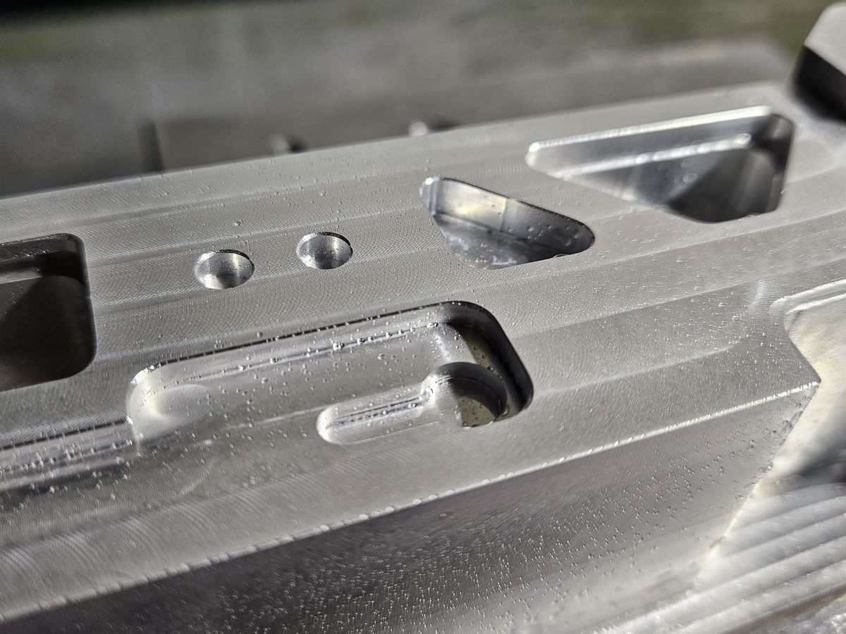 Milled pockets and holes replicated from a sample part
